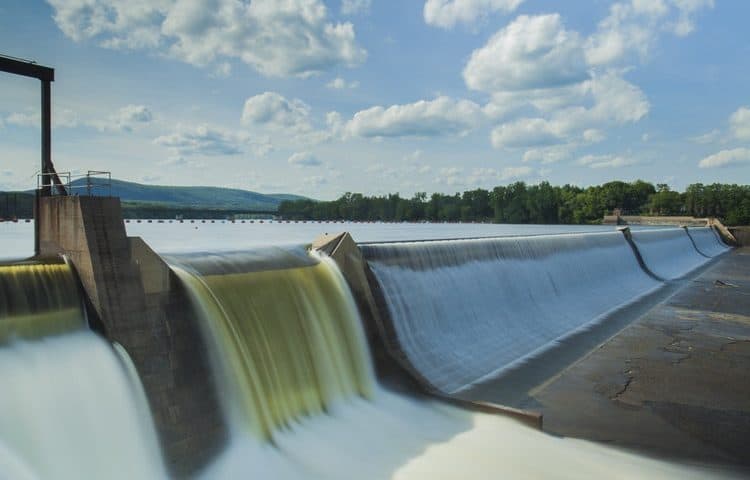 A large water dam representing that Petrotech, which is based in Houston, TX, won a contract to upgrade the control systems of 13 hydroelectric facilities
