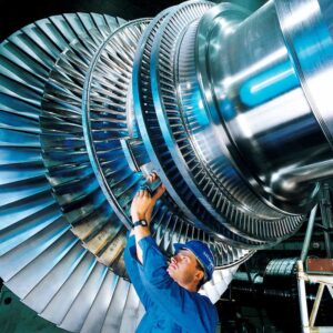 A man working on a steam turbine